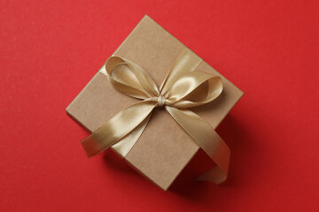 gift box with bow on red background