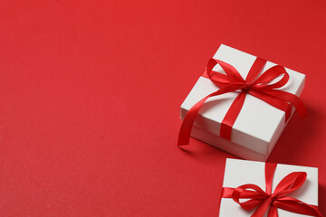 gift box with bow on red background