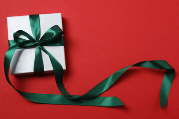 gift box with bow on red background