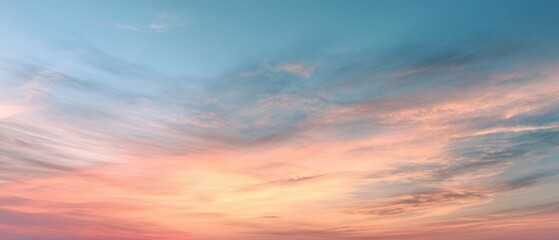 Fototapeta premium The delicate hues of a tranquil sunset sky at dusk