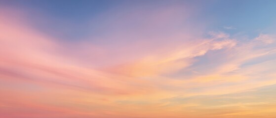 Obraz premium The serene sky displaying vibrant colors at sunset for a peaceful atmosphere.