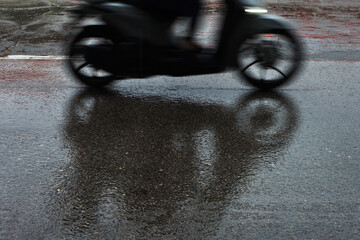 Motorbike on the wet road.
