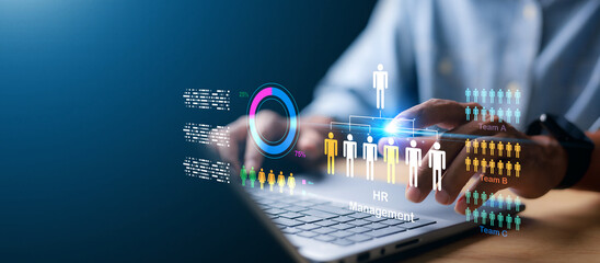Businessman using stylus on tablet with digital HR management interface, employee structure chart,...