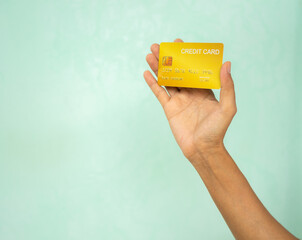 Hand holding credit card black mockup, debit shop online payment loan money business finance,...