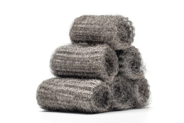 Steel wool, also known as iron wool or wire sponge. commonly used as an abrasive for cleaning, polishing, and surface preparation. isolated in white background.