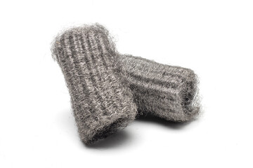 Steel wool, also known as iron wool or wire sponge. commonly used as an abrasive for cleaning, polishing, and surface preparation. isolated in white background.