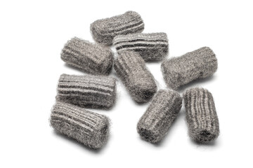 Steel wool, also known as iron wool or wire sponge. commonly used as an abrasive for cleaning, polishing, and surface preparation. isolated in white background.