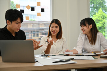 A Creative Team Discussing Building Plans, Architects Collaborating on Design Concepts