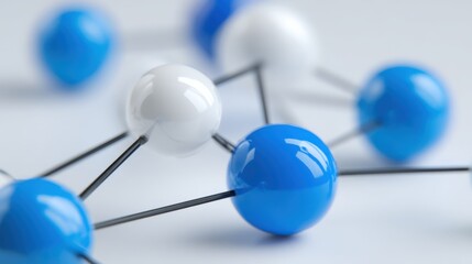 Close-up of molecular model with white and blue spheres connected by metal rods, representing chemical structures and scientific research.