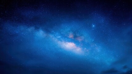 Fototapeta premium Stunning view of the Milky Way galaxy in the night sky with vibrant stars and cosmic dust.
