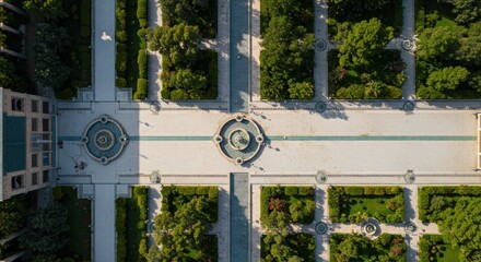 Aerial perspective: architectural symmetry and lush greenery converging in a grand formal garden
