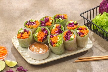 Vietnam Spring Roll. Vietnamese spring rolls, summer spring rolls, or salad spring rolls, a traditional dish in Vietnamese cuisine consisting of pork, shrimp, vegetables, bún, and other ingredients wr