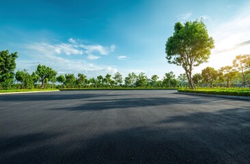 Empty asphalt floor and green garden park landscape background with blue sky and sunlight. Empty car stage for a sport, competition, or event on a summer day. Wide-angle lens, natural lighting. 