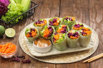 Vietnam Spring Roll. Vietnamese spring rolls, summer spring rolls, or salad spring rolls, a traditional dish in Vietnamese cuisine consisting of pork, shrimp, vegetables, bún, and other ingredients wr