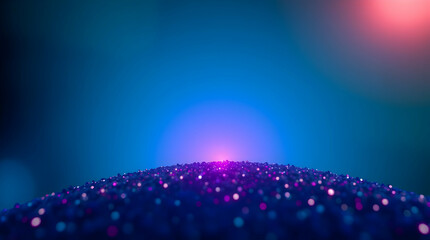 Sparkling purple and blue particles on a teal background