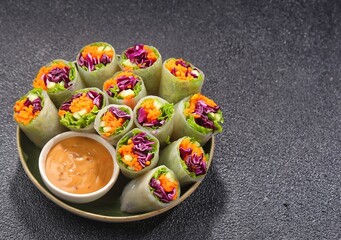 Vietnam Spring Roll. Vietnamese spring rolls, summer spring rolls, or salad spring rolls, a traditional dish in Vietnamese cuisine consisting of pork, shrimp, vegetables, bún, and other ingredients wr