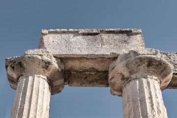 Close-up of Doric entablature fragment at Apollo temple in ancient Corinth, Greece