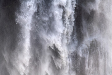 water falling at the waterfall in Victoria Falls National Park
