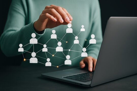 A network of interconnected people displayed on a laptop screen.