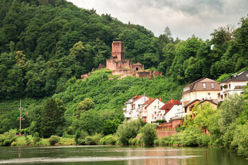 Fototapeta premium beautiful landscape of mountain village and ruins of an old castle on a cloudy day