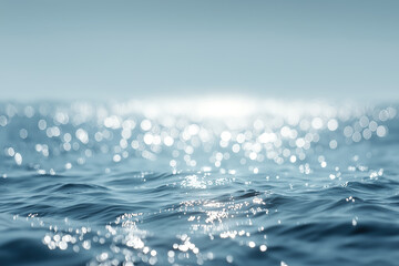 Beautiful blurred background of natural light and water on the sea 