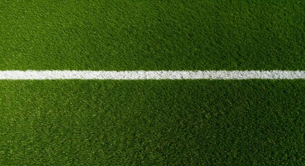 Fototapeta premium Thick horizontal white painted line is running across green grass turf in flat vector illustration, wallpaper, a green grass field with a thick white line running horizontally across the center.