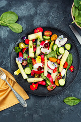 White asparagus salad with flowers.