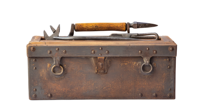 Antique metal toolbox filled with tools