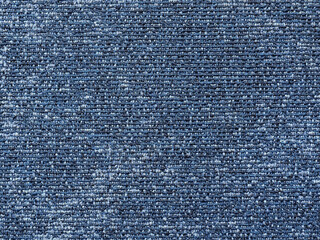 Close-up abstract background of blue modern carpet.