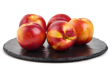 Nectarines on Slate, isolated on white background