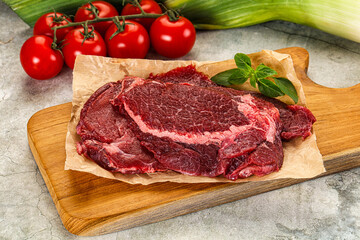 Raw beef cheeks cut for cooking