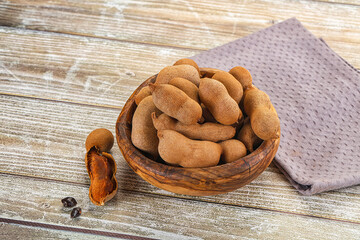 Tropical exotic Tamarind fruit heap