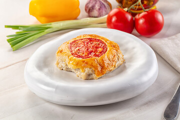 Chicken chop cutlet with cheese and tomato