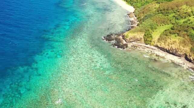 Aerial top down view on coral reef hideaway beach of Tokoriki island in Fiji resort.
