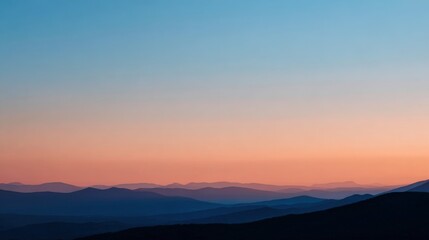 Obraz premium Beautiful Sunset Sky Over Mountain Range with Colorful Gradient and Silhouette Landscape.