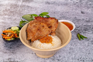Roasted pork steak with rice