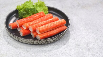 Crab sticks or crab sticks  or kanikama are processed foods made from surimi which are shaped and colored to resemble crabs. © Noor