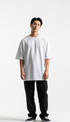 Fototapeta premium A model wearing an oversized white t-shirt, Mockup Oversized T-Shirt