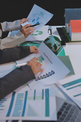 Asian woman lead young group of multiethnic businesspeople in team meeting, using laptop computer for ESG topic presentation on monitor. Sustainable business practice, people work at home concept