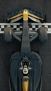 Top view of a generic formula one race car driving across the finish line in slow motion. 3d animation rendering. New 2025 black and gold race car design