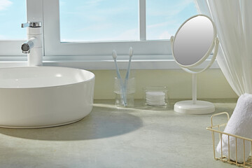 Elegant minimalist bathroom with round tub, standing mirror, and sheer curtains by the window....