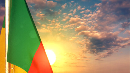 Benin flag is hanging on sunrise sky for veterans day - defocused - object 3D rendering