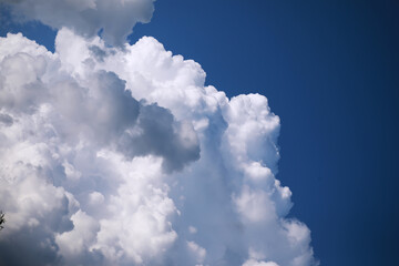 The sky is blue with clouds, beautiful by nature.
