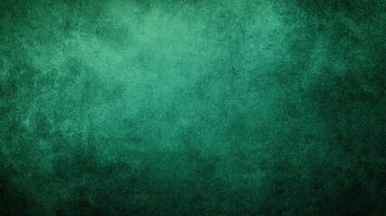 Fototapeta premium Deep green textured background with a vibrant and uniform surface pattern for design use.