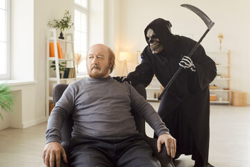 Senior man expecting, dying, Grim Reaper of Death with scythe finding new victim, shoulder touching...