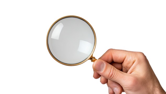 Hand holding a vintage-style magnifying glass