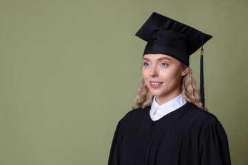 Happy student after graduation on green background. Space for text