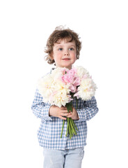 Cute little boy with bouquet of beautiful peonies on white background