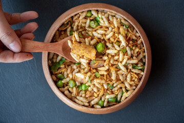 A bowl of rice with a spoon in it