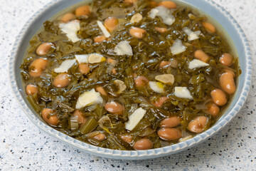 Chicory and bean soup.